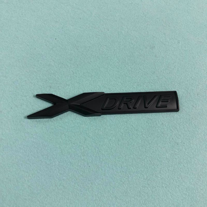 X Drive Performance Emblem